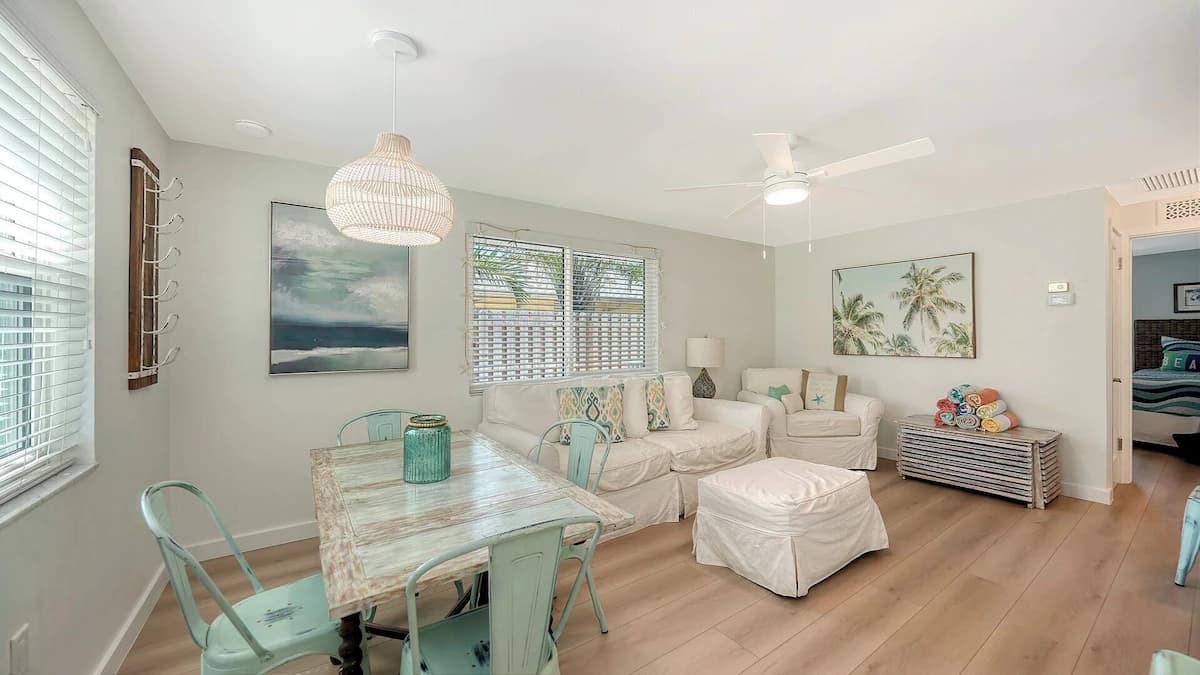 Living and dining area with a sofa and the dining table